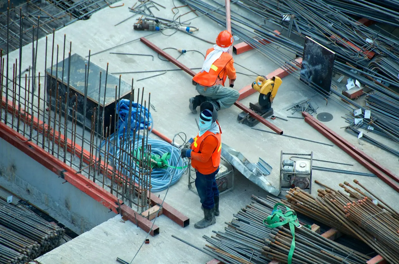 Construction team carrying out structural building work on site